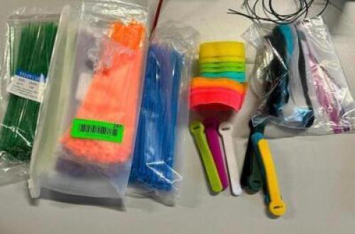 DESCRIPTION: ASSORTED CABLE TIES LOCATION: BOTTOM FLOOR QTY: 1