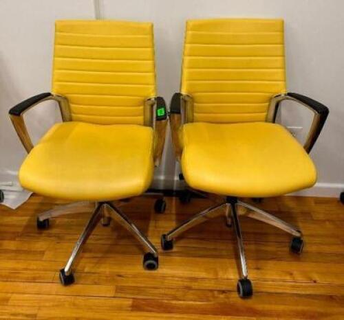 DESCRIPTION: (2) ARMED ROLLABOUT OFFICE CHAIRS LOCATION: 2ND FLOOR QTY: 2