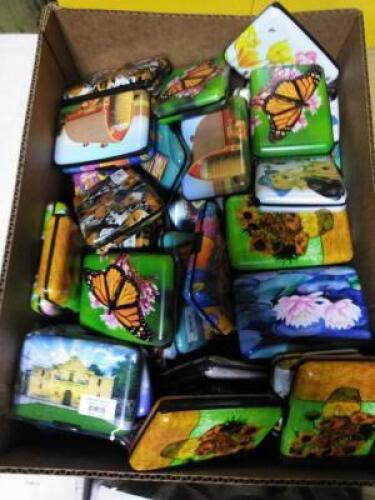 DESCRIPTION: (1) CASE OF APPROX (50) METAL WALLETS BRAND/MODEL: ARMORED WALLET INFORMATION: MANY DESIGNS QTY: 1