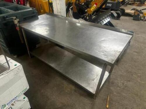 DESCRIPTION 72" X 30" STAINLESS TABLE W/ MOUNTED CAN OPENER. SIZE 72" X 30" LOCATION BAY 6 QTY 1