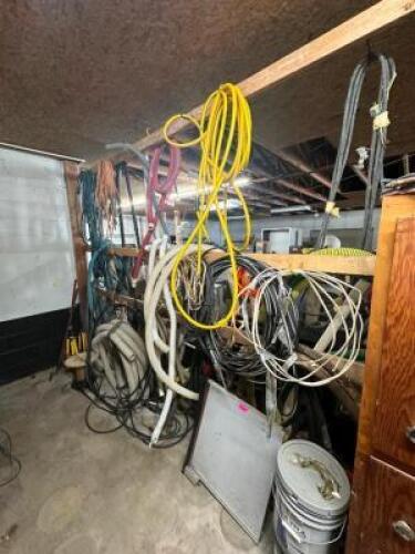 LARGE GROUP OF ASSORTED VAC HOSES AND CORDS