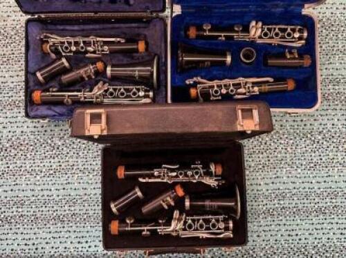 (3)- PLASTIC BUNDY CLARINETS