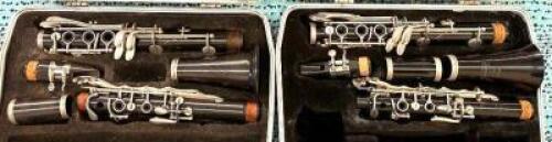 (2)- PLASTIC BUNDY CLARINETS
