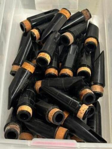 BIN OF Bb CLARINET MOUTH PIECES