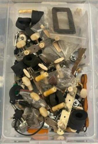 BIN OF ASSORTED STRING PARTS