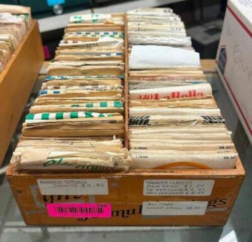 BIN OF ASSORTED ACOUSTIC AND CLASSICAL STRINGS