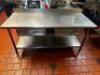 DESCRIPTION 72" X 30" ALL STAINLESS TABLE W/ 4" BACK SPLASH SIZE 72" X 30" LOCATION KITCHEN QTY 1 - 5