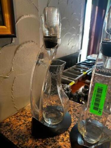 DESCRIPTION (2) GLASS AERATOR W/ STANDS THIS LOT IS: SOLD BY THE PIECE LOCATION ROOM 1 QTY 2