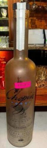 DESCRIPTION LARGE EMPTY BOTTLE OF CHOPIN VODKA LOCATION BAR QTY 1
