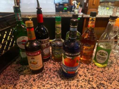 DESCRIPTION MILK CRATE AND CONTENTS - ASSORTED PARTIAL BOTTLES OF ALCOHOL. ADDITIONAL INFORMATION SEE PICTURE FOR ITEMS IN LOT. LOCATION BAR QTY 1