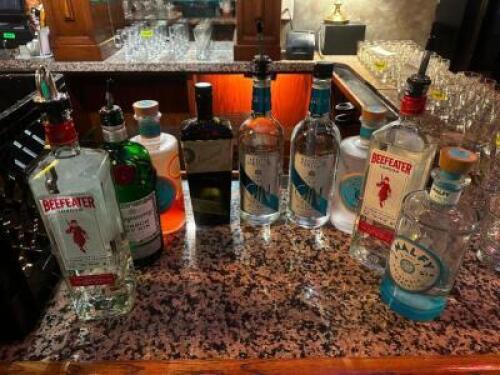 DESCRIPTION MILK CRATE AND CONTENTS - ASSORTED PARTIAL BOTTLES OF ALCOHOL. ADDITIONAL INFORMATION SEE PICTURE FOR ITEMS IN LOT. LOCATION BAR QTY 1
