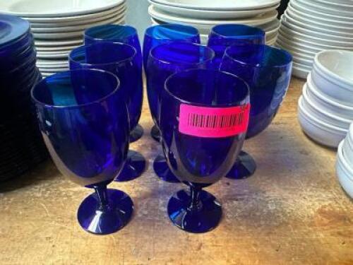 DESCRIPTION (8) BLUE GLASS GOBLETS. THIS LOT IS: SOLD BY THE PIECE LOCATION BASEMENT 1 QTY 8