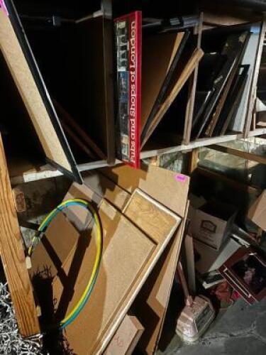 DESCRIPTION (1) LOT OF ASSORTED BROKEN PICTURE FRAMES AND POSTERS. LOCATION BASEMENT 3 QTY 1