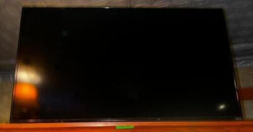 DESCRIPTION: VIZIO 52" FLAT SCREEN TV. BRAND / MODEL: VIZIO ADDITIONAL INFORMATION: IN WORKING ORDER. LOCATION: BAR QTY: 1