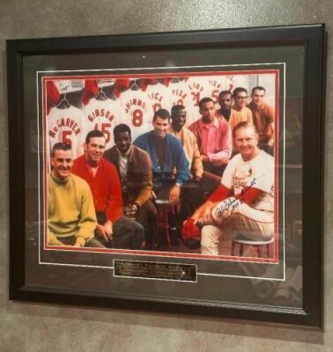 DESCRIPTION: "MILLION DOLLAR TEAM" 1967 ST. LOUIS CARDINALS FRAMED TEAM PHOTO ADDITIONAL INFORMATION: SIGNED BY RED SCHOENDIENST. SIZE: 27" X 22" LOCA