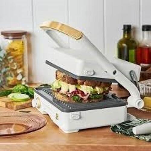 DESCRIPTION: (1) 2 IN ONE PANINI PRESS AND GRILL BRAND/MODEL: BEAUTIFUL INFORMATION: WHITE RETAIL$: $50.00 EA QTY: 1