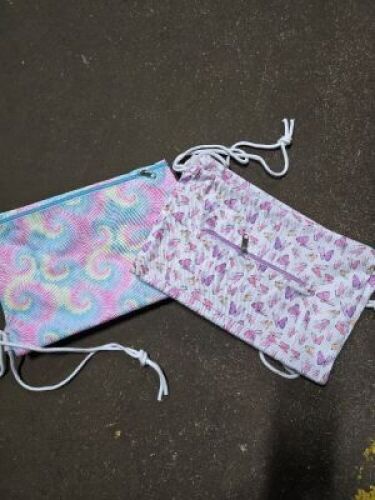 DESCRIPTION: (8) PACKS OF (2) DRAWSTRING BAGS INFORMATION: BUTTERFLIES OR TYE DYE QTY: 8