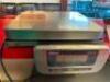 DESCRIPTION EDLUND EPZ-10 DIGITAL PORTION SCALE BRAND / MODEL: EDLUND EPZ-10 LOCATION COUNTER QTY 1 - 2