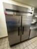 DESCRIPTION MANITOWOC / DELFIELD TWO DOOR REACH IN COOLER. BRAND / MODEL: MANITOWOC 6051XL-S ADDITIONAL INFORMATION ON AND WORKING. 115 VOLT, 1 PHASE - 2