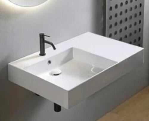 DESCRIPTION: (1) CERAMIC WALL MOUNTED SINK WITH COUNTER SPACE BRAND/MODEL: CASTELLO #GM-2056-762-L INFORMATION: WHITE MATTE SIZE: 30" X 18.9" X 5.1" R