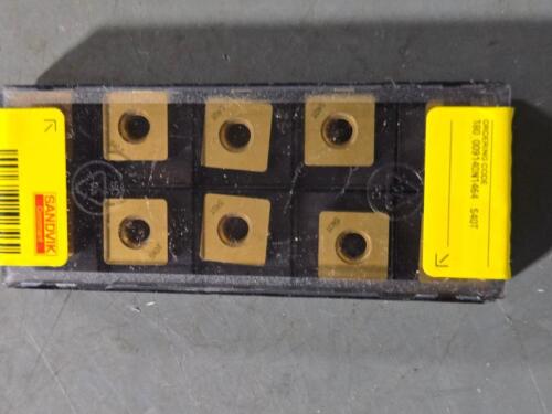 DESCRIPTION: (30) CARBIDE MODULMILL INSERTS BRAND/MODEL: SANDVIK COROMANT 180_009140N1464 S40T RETAIL$: $628.50 QTY: 30