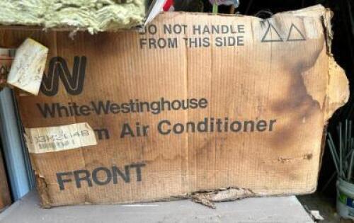 WHITE WINDOW AIR CONDITIONER UNIT