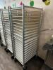 DESCRIPTION WINHOLT TWENTY PAN TRAY RACK W/ PLASTIC DOUGH SHEET. BRAND / MODEL: WINHOLT AL-1820BKD/HD/PO LOCATION FRONT QTY 1