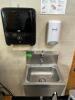DESCRIPTION ADVANCE TABCO STAINLESS WALL SINK W/ KNEE PEDALS ADDITIONAL INFORMATION W/ TOWEL AND SOAP DISPENSERS. LOCATION FRONT QTY 1