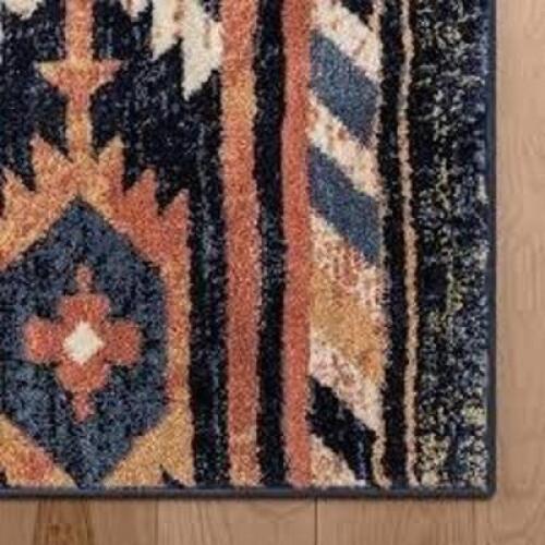 DESCRIPTION: (1) AREA RUG BRAND/MODEL: TAYSE INFORMATION: ORANGE AND NAVY SIZE: 2'3'' X 7'3" RETAIL$: $63.79 EA QTY: 1