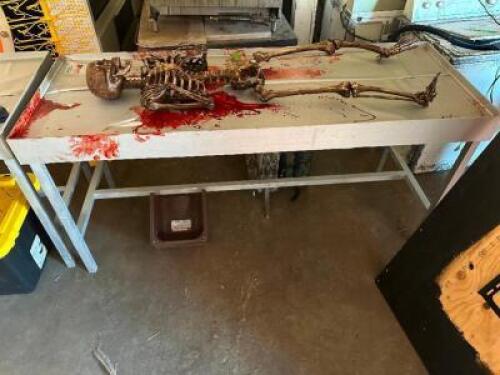 WOODEN MORGUE TABLE PROP W/ BLOODY SKELETON.