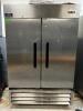 ARCTIC AIR AF49 TWO DOOR REACH IN FREEZER W/ TRAY RACK INSERTS.