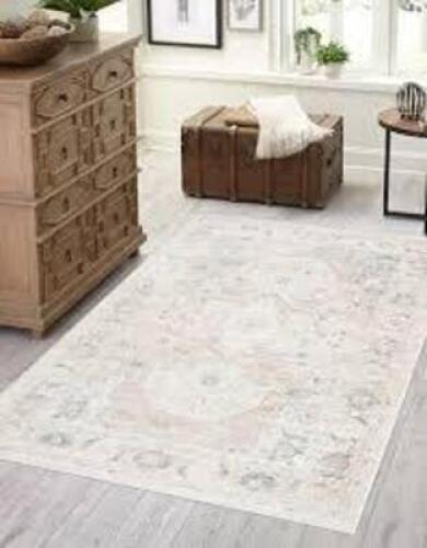 DESCRIPTION: (1) AREA RUG BRAND/MODEL: #TML1502 8X10 INFORMATION: IVORY SIZE: 7'10" X 10'2" QTY: 1