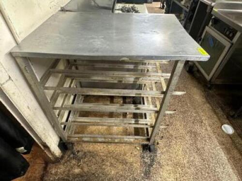 30" X 24" STAINLESS TABLE W/ TRAY RACK BASE.