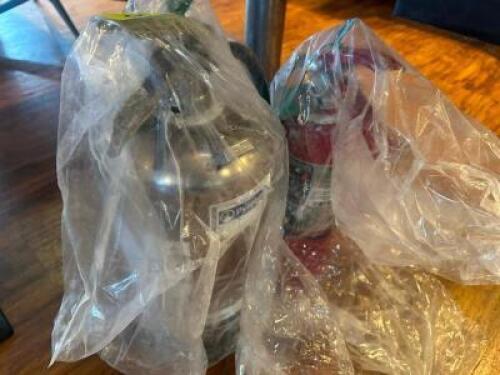 (1) WET CHEMICAL AND (1) DRY CHEMICAL FIRE EXTINGUISHER.