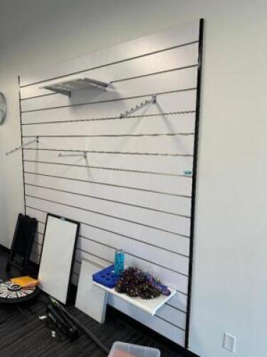 DESCRIPTION (2) SECTIONS OF 6' X 6' SLAT WALL ADDITIONAL INFORMATION W/ LARGE GROUP OF ASSORTED HANGERS AND SLAT WALL ATTACHMENTS. LOCATION FRONT QTY