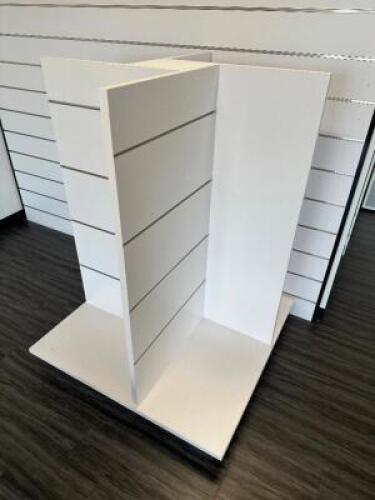 DESCRIPTION (2) FOUR WAY SLAT FLOOR DISPLAYS. THIS LOT IS: SOLD BY THE PIECE LOCATION FRONT QTY 2