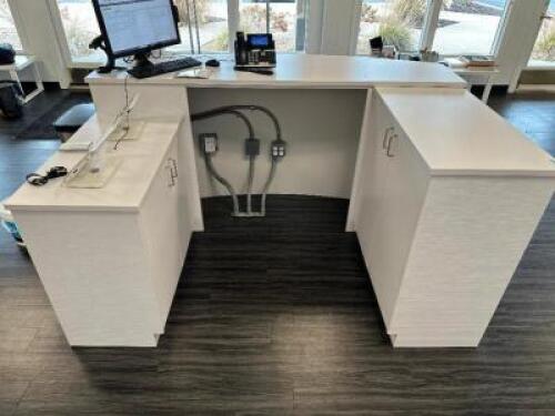 DESCRIPTION " U" SHAPED WHITE COMPOSITE RECEPTION DESK. SIZE: 5' X 3' X 3' LOCATION FRONT QTY 1