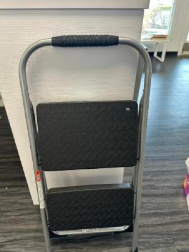 DESCRIPTION TWO STEP FOLDING LADDER. LOCATION FRONT QTY 1