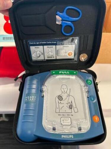 DESCRIPTION PHILIPS AED DEVICE. BRAND / MODEL: PHILIPS LOCATION FRONT QTY 1