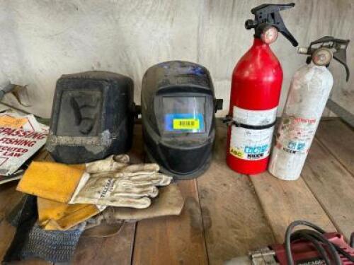 (2) WELDING HOODS, (2) FIRE EXTINGUISHERS, AND (1) PAIR OF WELDING GLOVES.