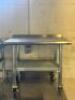 36 "X 24" STAINLESS TABLE W/ 2" BACK SPLASH. - 2