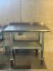 36 "X 24" STAINLESS TABLE W/ 2" BACK SPLASH. - 4