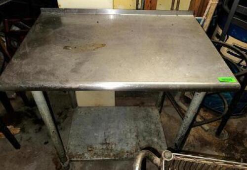 36 "X 24" STAINLESS TABLE W/ 1" BACK SPLASH
