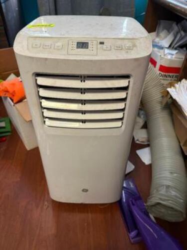 G.E. PORTABLE AIR CONDITIONER.