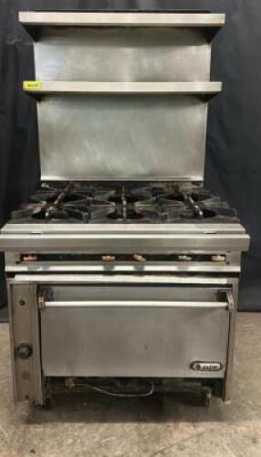 DESCRIPTION JADE RANGE SIX BURNER RANGE W/ LOWER CONVENTIONAL OVEN. BRAND / MODEL: JADE RANGE ADDITIONAL INFORMATION NATURAL GAS. W/ STAINLESS DOUBLE