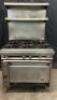 DESCRIPTION JADE RANGE SIX BURNER RANGE W/ LOWER CONVENTIONAL OVEN. BRAND / MODEL: JADE RANGE ADDITIONAL INFORMATION NATURAL GAS. W/ STAINLESS DOUBLE
