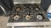 DESCRIPTION JADE RANGE SIX BURNER RANGE W/ LOWER CONVENTIONAL OVEN. BRAND / MODEL: JADE RANGE ADDITIONAL INFORMATION NATURAL GAS. W/ STAINLESS DOUBLE - 4