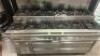 DESCRIPTION JADE RANGE TWELVE BURNER GAS RANGE W/ REFRIGERATED DRAWER BASE. BRAND / MODEL: JADE RANGE ADDITIONAL INFORMATION NATURAL GAS, 115 VOLT, 1 - 3