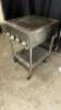 DESCRIPTION 24" FOUR BURNER RADIANT CHARBROILER. ADDITIONAL INFORMATION NATURAL GAS, ON CASTERS SIZE 24" LOCATION BAY 6 QTY 1 - 6