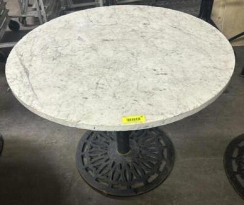 DESCRIPTION 30" ROUND MARBLE TABLE W/ CAST IRON BASE. SIZE 30" R LOCATION BAY 6 QTY 1